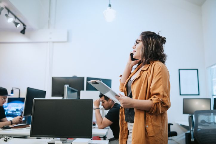 woman talking on the phone in the office