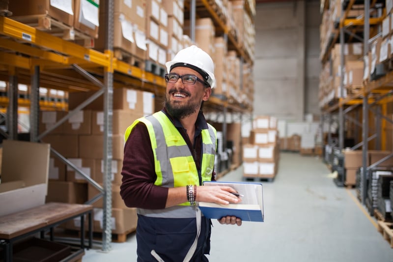 warehouse worker looking at stock