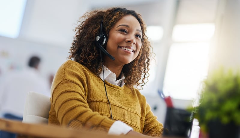 customer support worker talking on headset