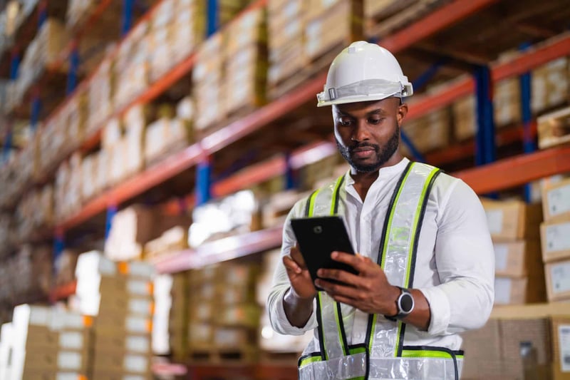 worker checking warehouse order process