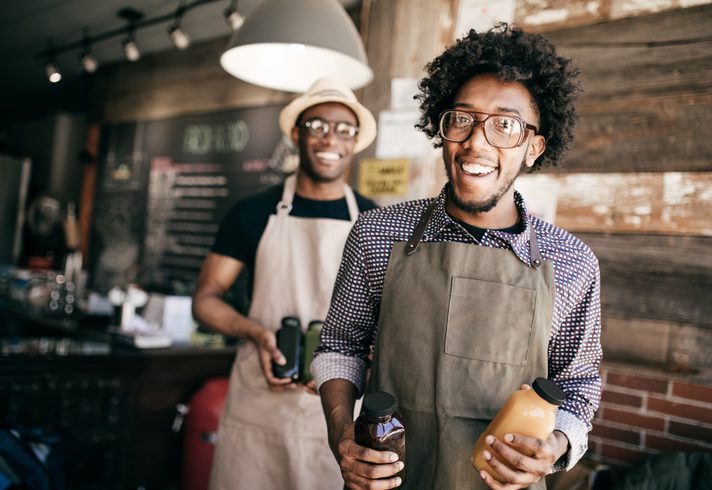 smiling store owners